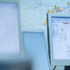 Engineer monitoring wind farm using fiber sensing